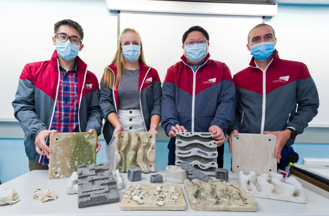 Professor Kenneth Leung (second from right) and researchers show different man-made ecologically engineered fixtures